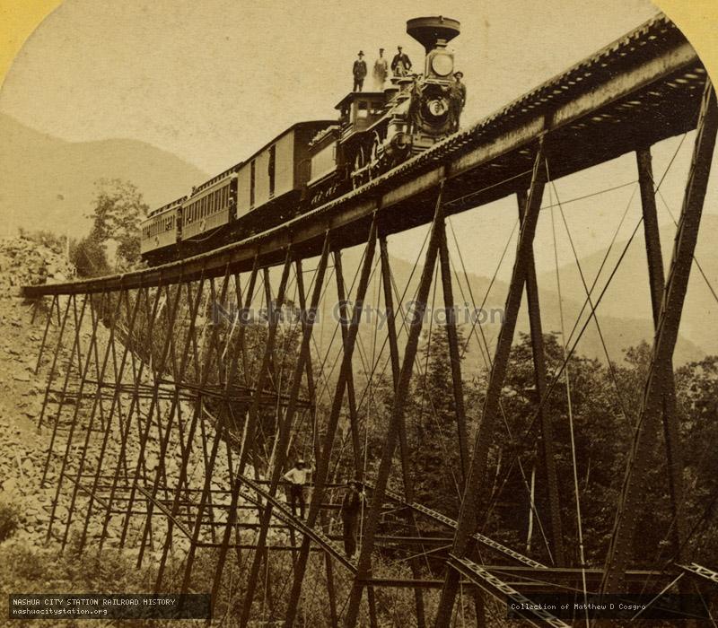 Stereoview: Frankenstein Trestle and Train, Portland & Ogdensburg Railroad, Crawford Notch, White Mountains